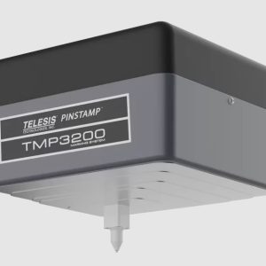 Detalle del caezal de la marcadora Telesis PINSTAMP TMP3200 mostrando el sistema de punzón neumático de alta precisión para marcado uniforme